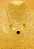 Gold plated necklace featuring yellow and black semi precious stones. Handcrafted statement jewellery.