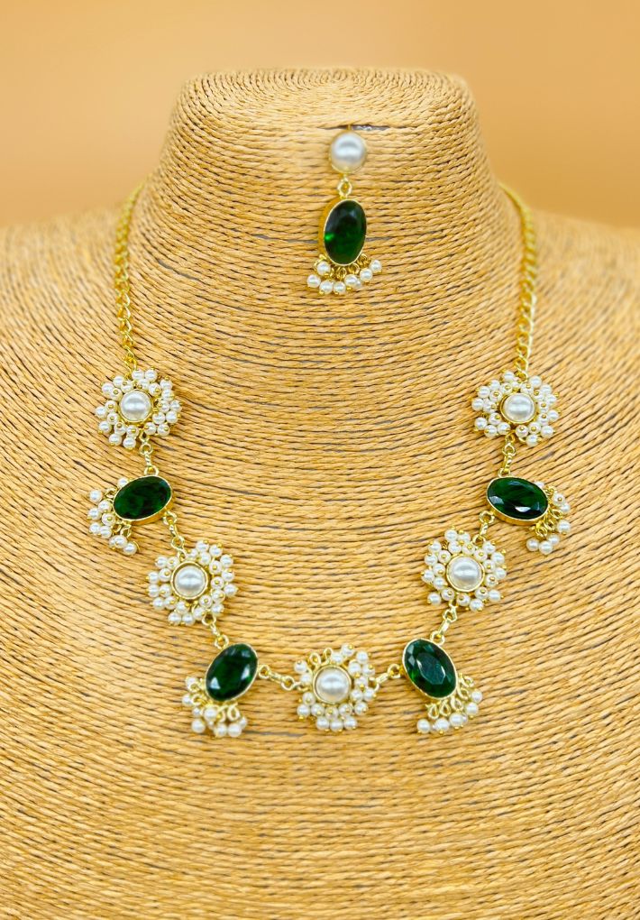 Gold plated necklace and earring set featuring monalisa stones and pearls. Handcrafted statement jewellery.