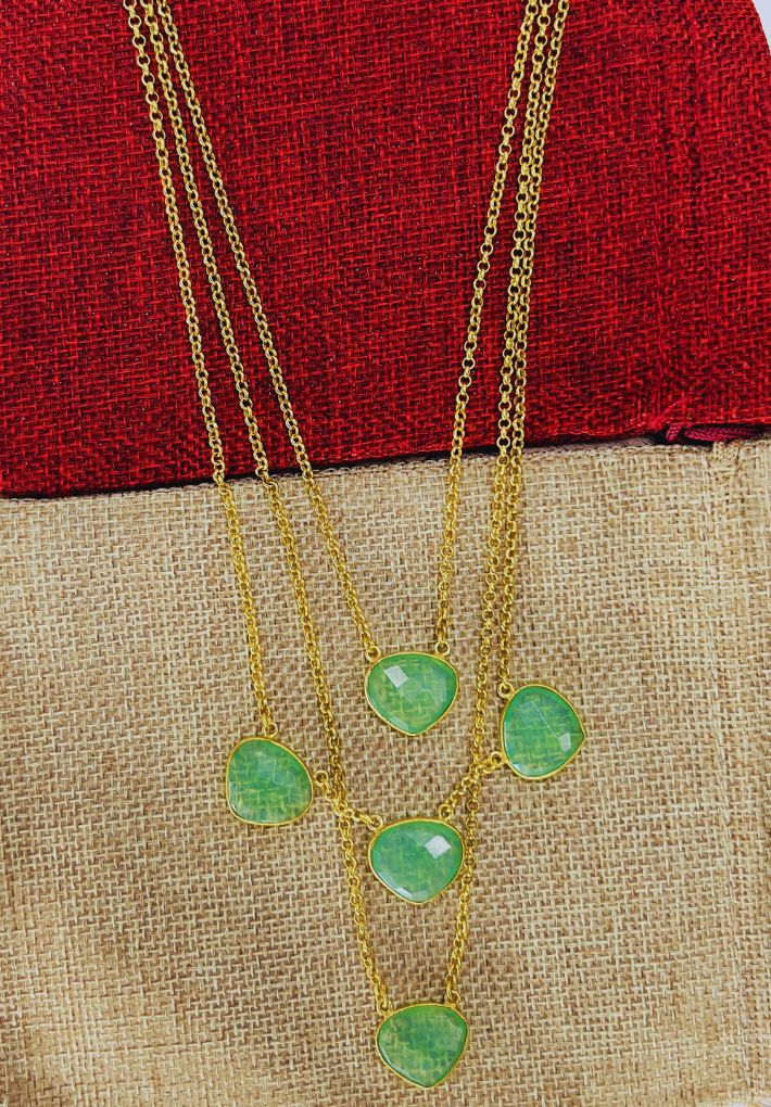 Gold plated necklace featuring glass stone. Handcrafted statement jewellery.