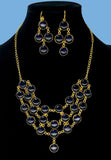 Gold plated 3 layered necklace and earring featuring dark blue stones. Handcrafted statement jewellery.