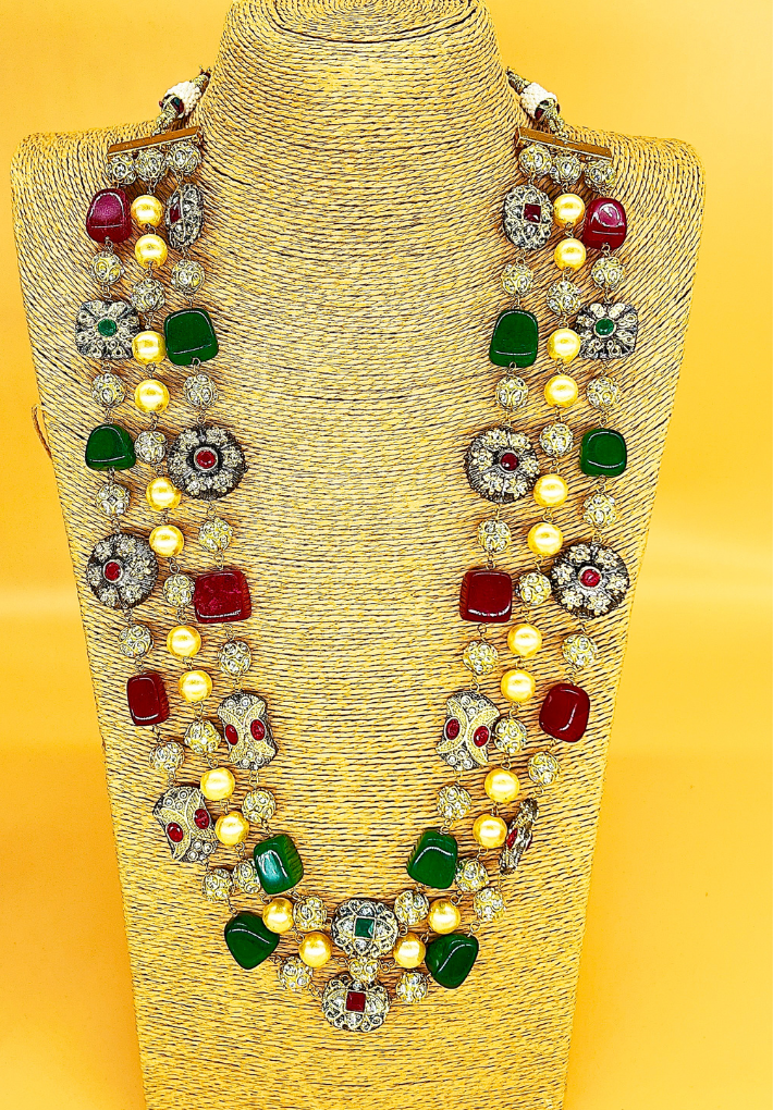 Beautiful long multi coloured haram with tanjore beads and pearls and matching earing