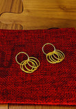 Gold plated loop earrings. Handcrafted statement jewellery.