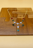 Gold plated necklace and earring set featuring multi colored semi precious  stones. Handcrafted statement jewellery.