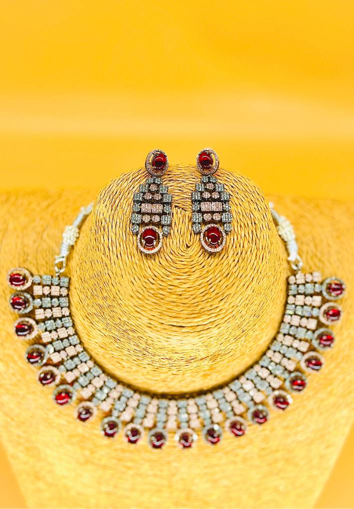 Dual tone American diamond studded necklace with ruby red monalisa stone and matching earing