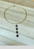 Beautiful hand crafted gold choker with bluestone long pendant