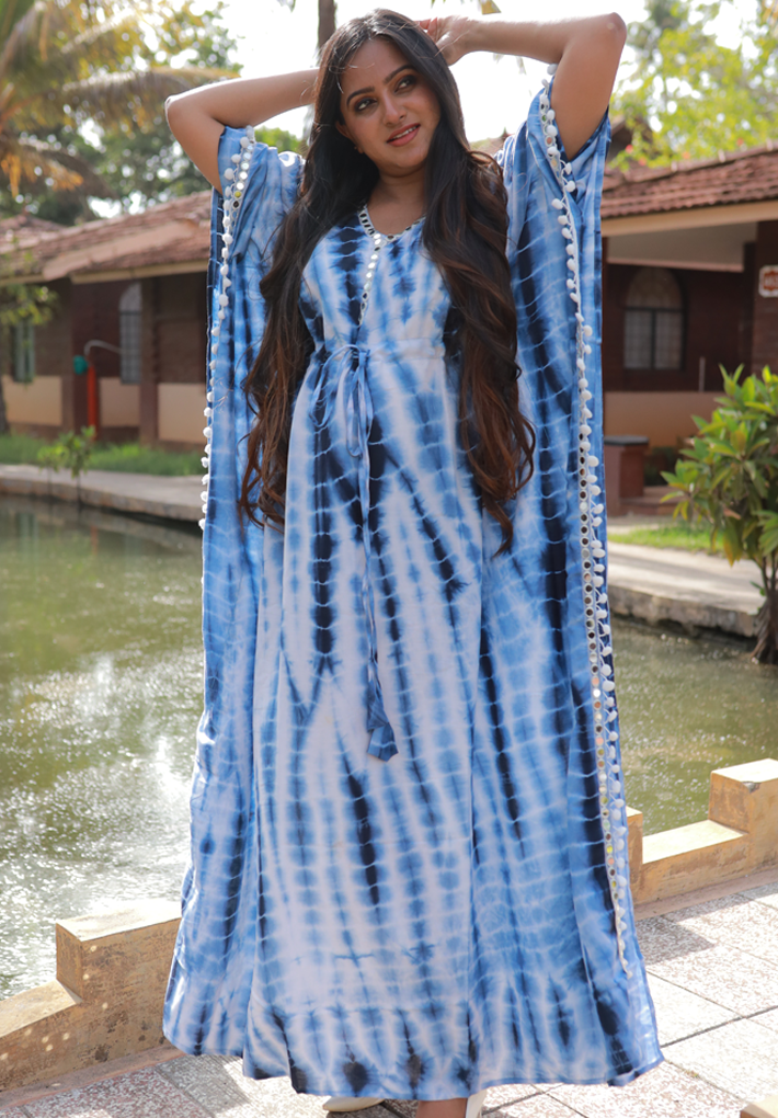 Kaftan - Leheriya printed blue kaftan in comfortable chanderi cotton with mirror work and pompom detail