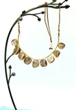 Beautiful necklace and earring set featuring elegant raw mother pearls. Handcrafted statement jewellery.