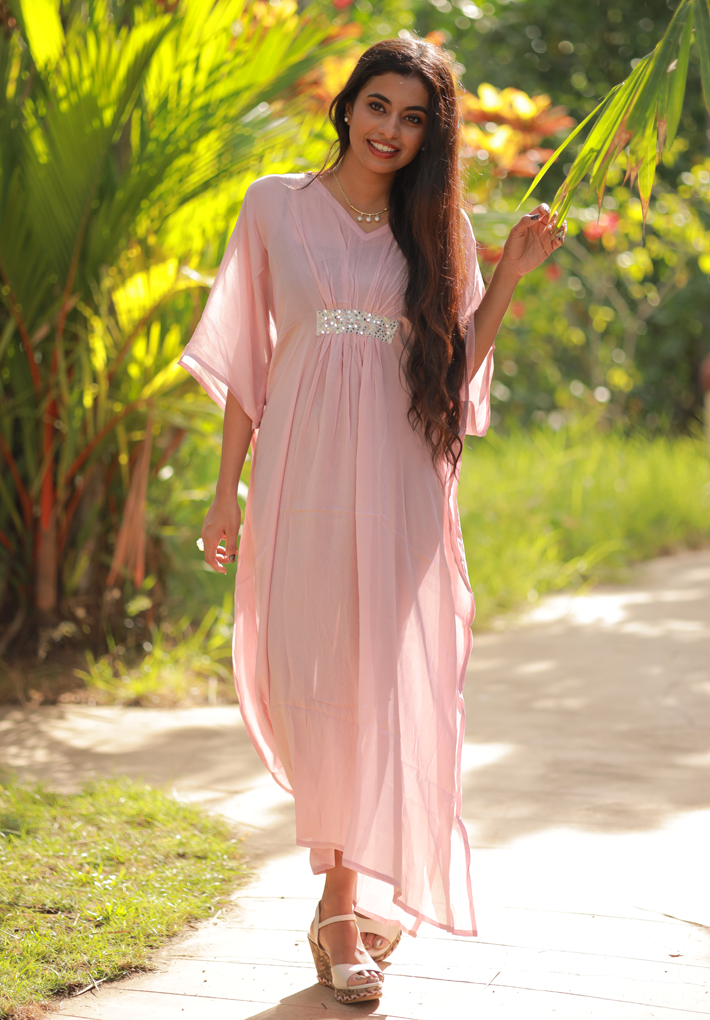 Beautiful semi transparent pastel pink kaftan in chinnon with mirror work and gather detail