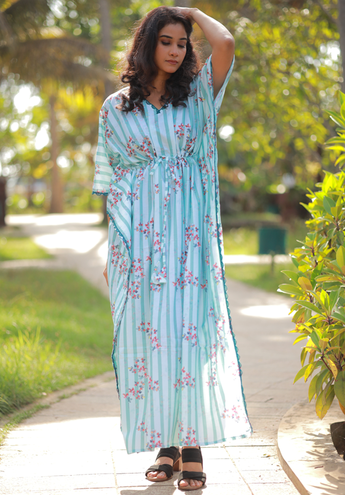 Beautiful white kaftan with green stripes and floral prints in muslin with  mild crochet work and gather detail