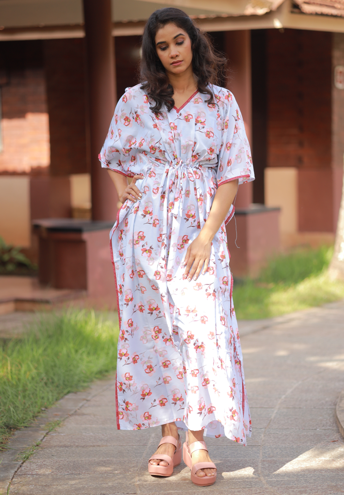 Beautiful floral print kaftan in muslin with  mild crochet work and gather detail