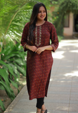 Kurti - Red rayon kurti with prints. 3/4th sleeve. Straight hemline.