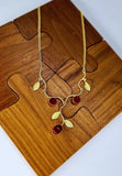 Gold plated  necklace with red stone
