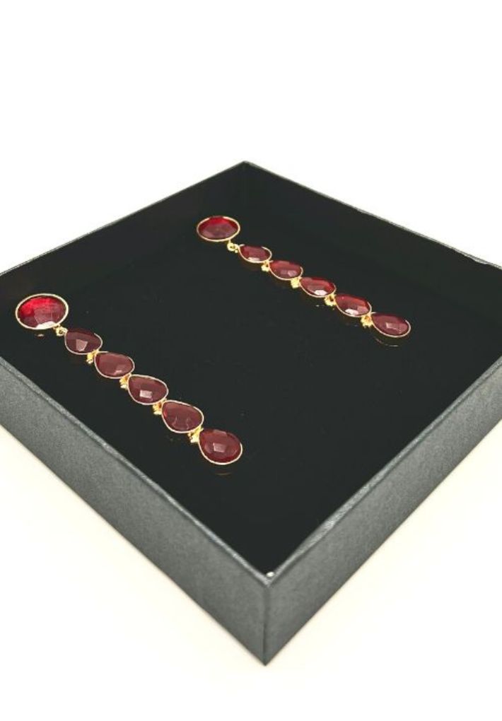 Beautiful earring set featuring dark red glossy stone. Handcrafted statement jewellery.