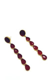 Beautiful earring set featuring dark red glossy stone. Handcrafted statement jewellery.