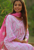 3 Piece Salwar - White salwar with pink prints, mirror work and elegant crochet work .Pink printed dupatta and matching pants. Round neck. 3/4th sleeve. Straight hemline