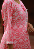 3 Piece Salwar - 100% Cotton pink salwar with white prints.White and pink printed dupatta and matching pants. Round neck. 3/4th sleeve. Straight hemline