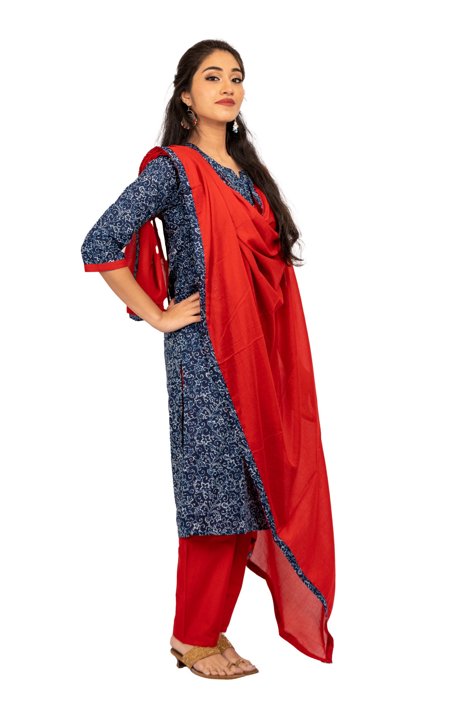 3 Piece Salwar - 100% Cotton indigo blue salwar with white floral prints. Plain red 2 metre long dupatta with edge design matching the salwar fabric. Plain red pants matching the dupatta.