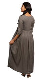 Full Gown - Grey full gown with rich silver embroidery in the front and gather detail. 3/4th Sleeve with matching embroidery at the tip. Round neck with V cut. Flared hemline deriving from the gather detail. Rayon material.