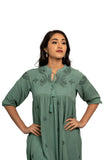 Tunic - Cotton crepe pastel green tunic with floral design embroidery and gather detail. 3/4th Sleeve with matching embroidery.